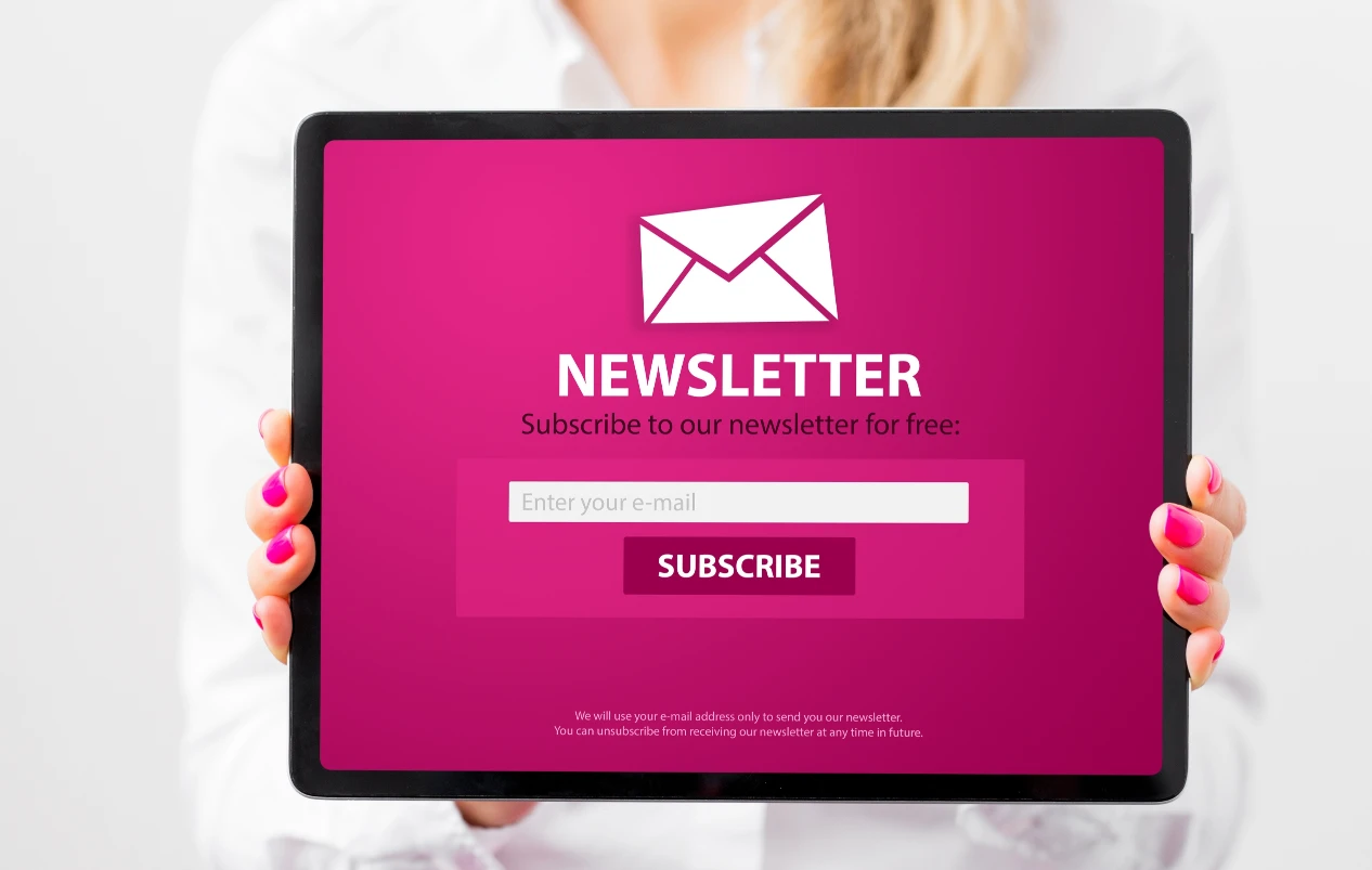 Newsletter Signup Screen Holding by a Woman