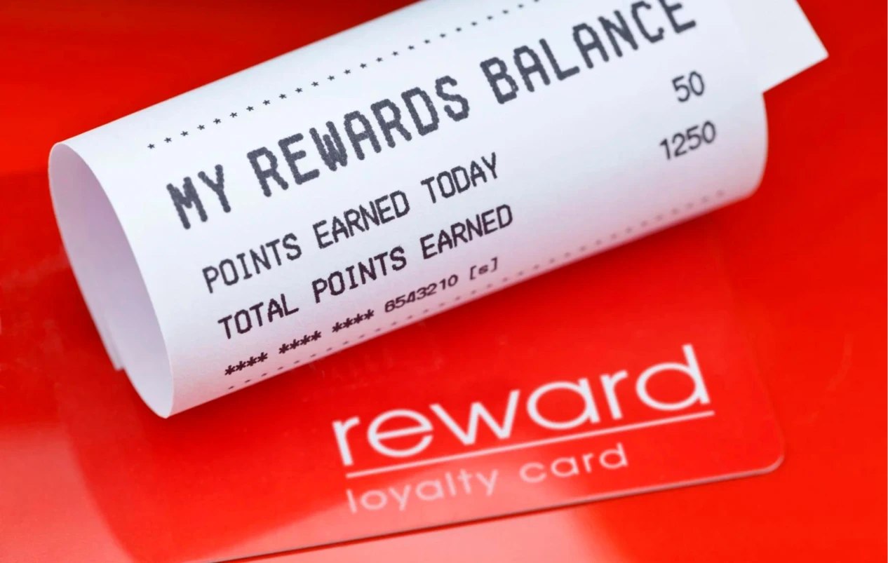 Reward Loyalty Card Next to the Store Receipt